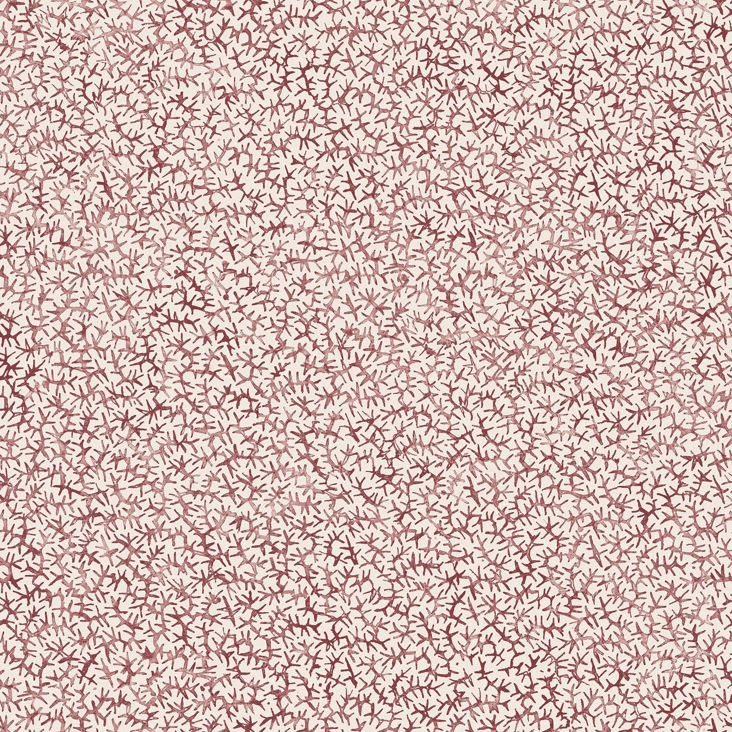 Printed fabric with small scale coral design in wine red on white. 
