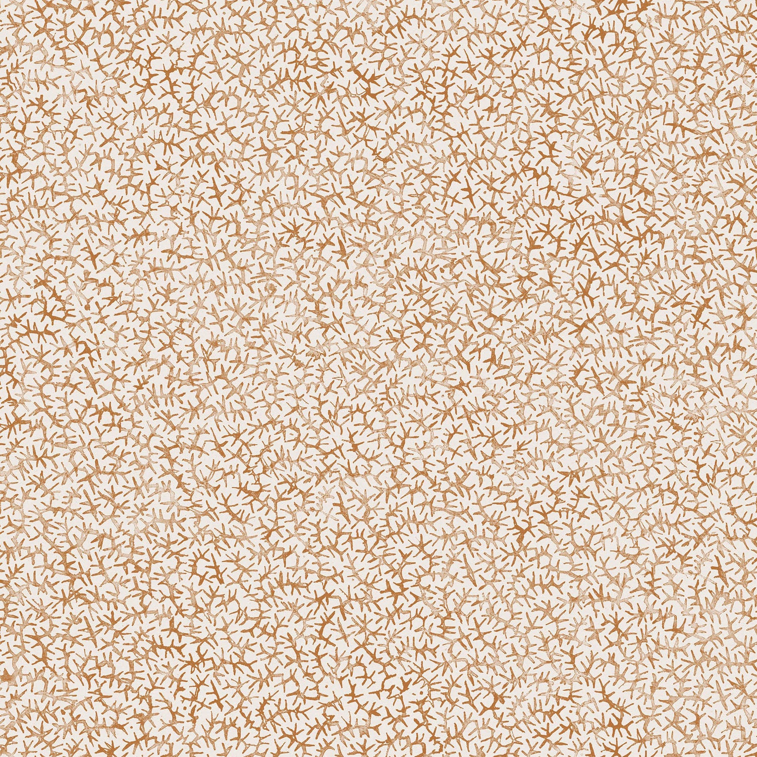 Printed fabric with small scale coral design in warm tan on white. 