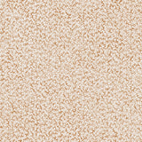 Printed fabric with small scale coral design in warm tan on white. 