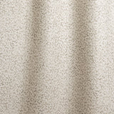 Draped fabric with small scale coral design in grey on white. 