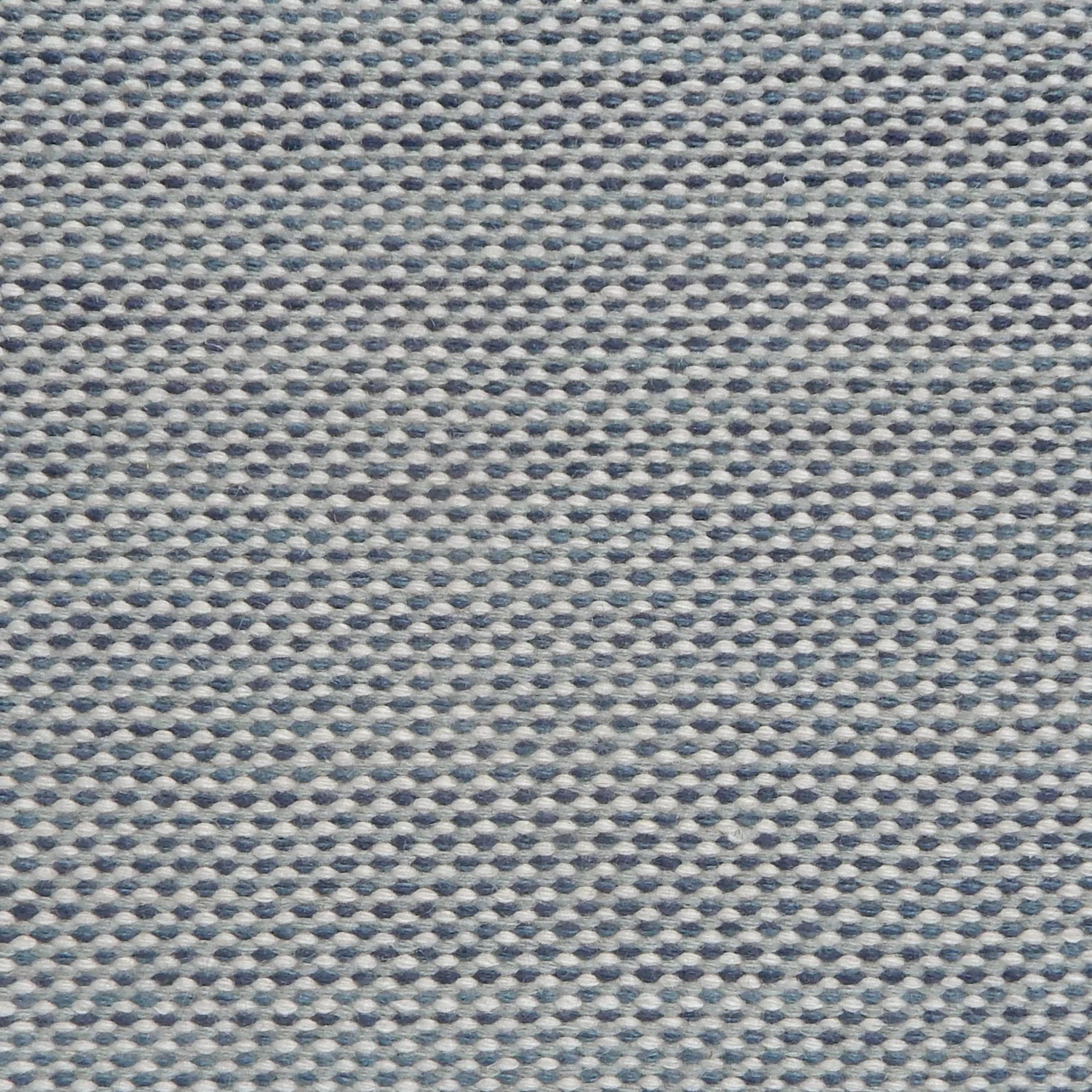 Textural handmade rug in shades of blue