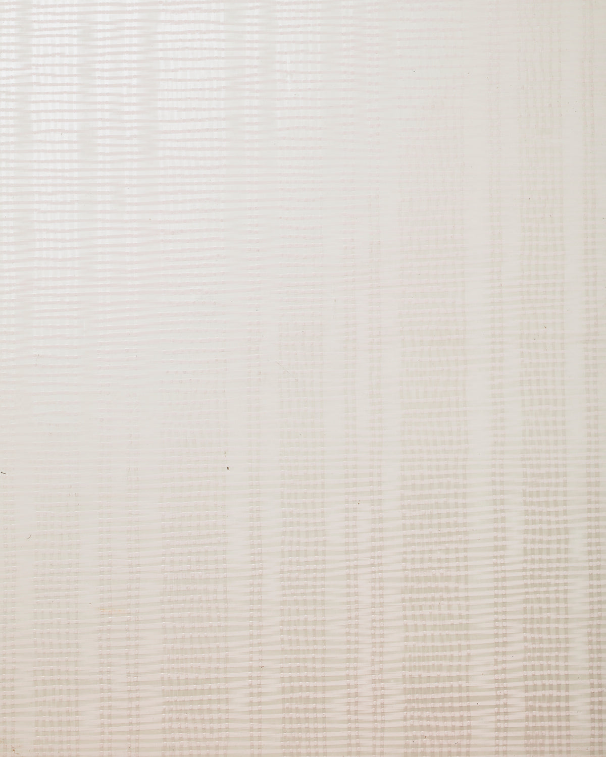 Detail of wallpaper in a textural stripe print in shades of cream.