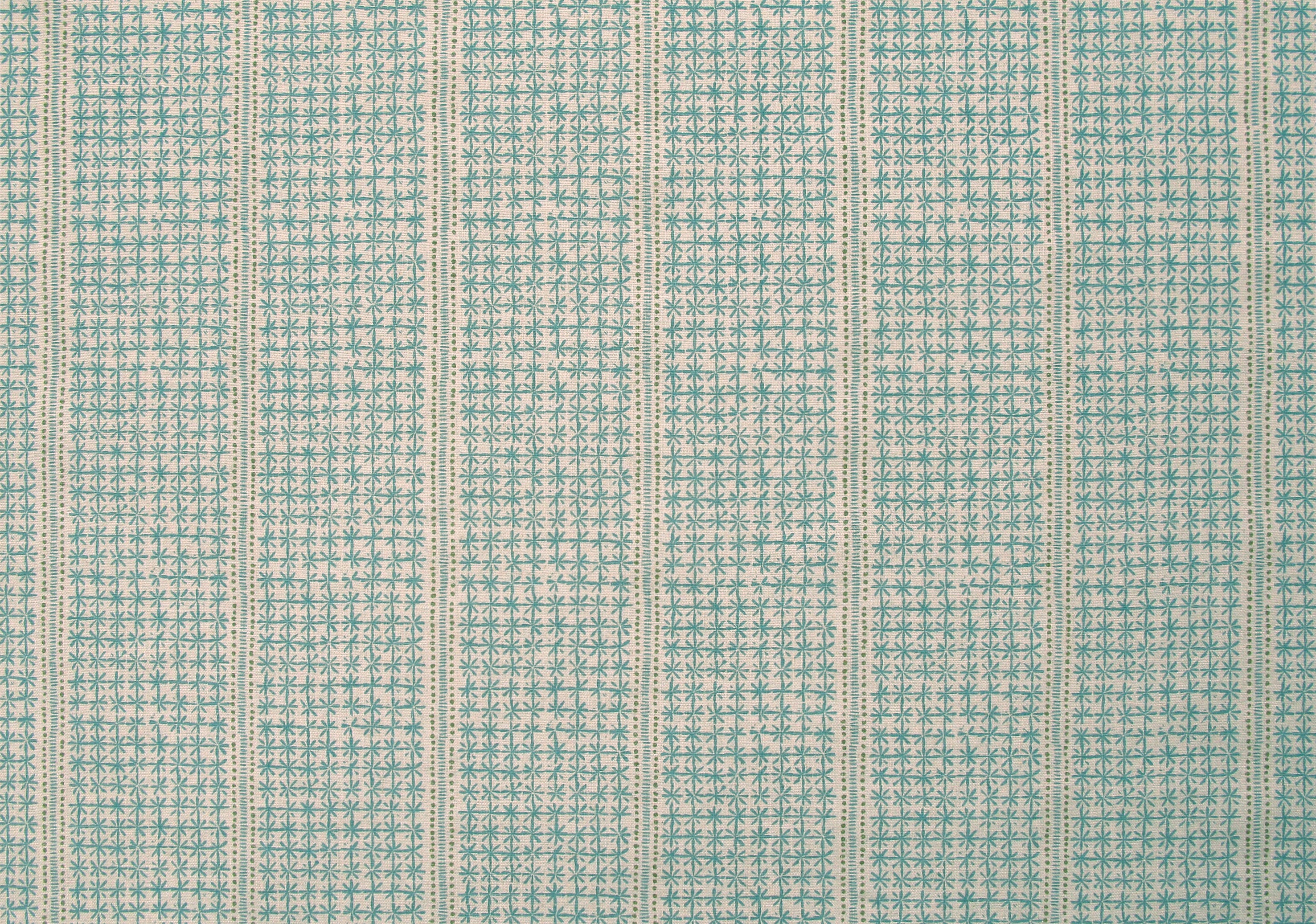Detail of fabric in a dense repeating stripe and star print in turquoise on a tan field.