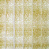 Detail of fabric in a dense repeating stripe and star print in mustard on a cream field.