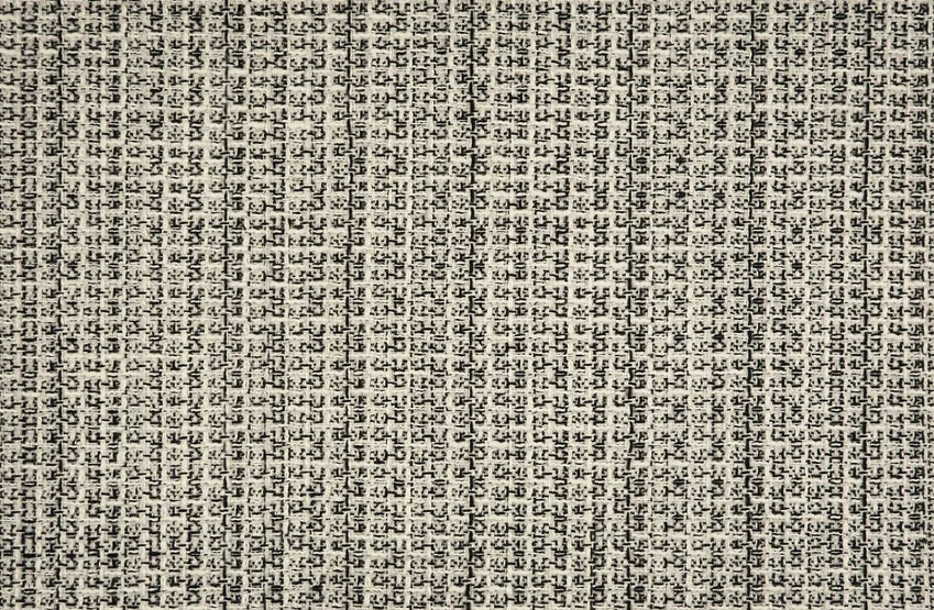 Broadloom carpet in a textural weave in black and white.