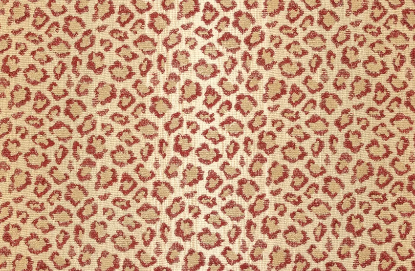Broadloom carpet swatch in a leopard skin pattern, in red and tan