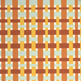 Close up of wallpaper with graphic plaid pattern in red, orange, yellow and aqua blue.