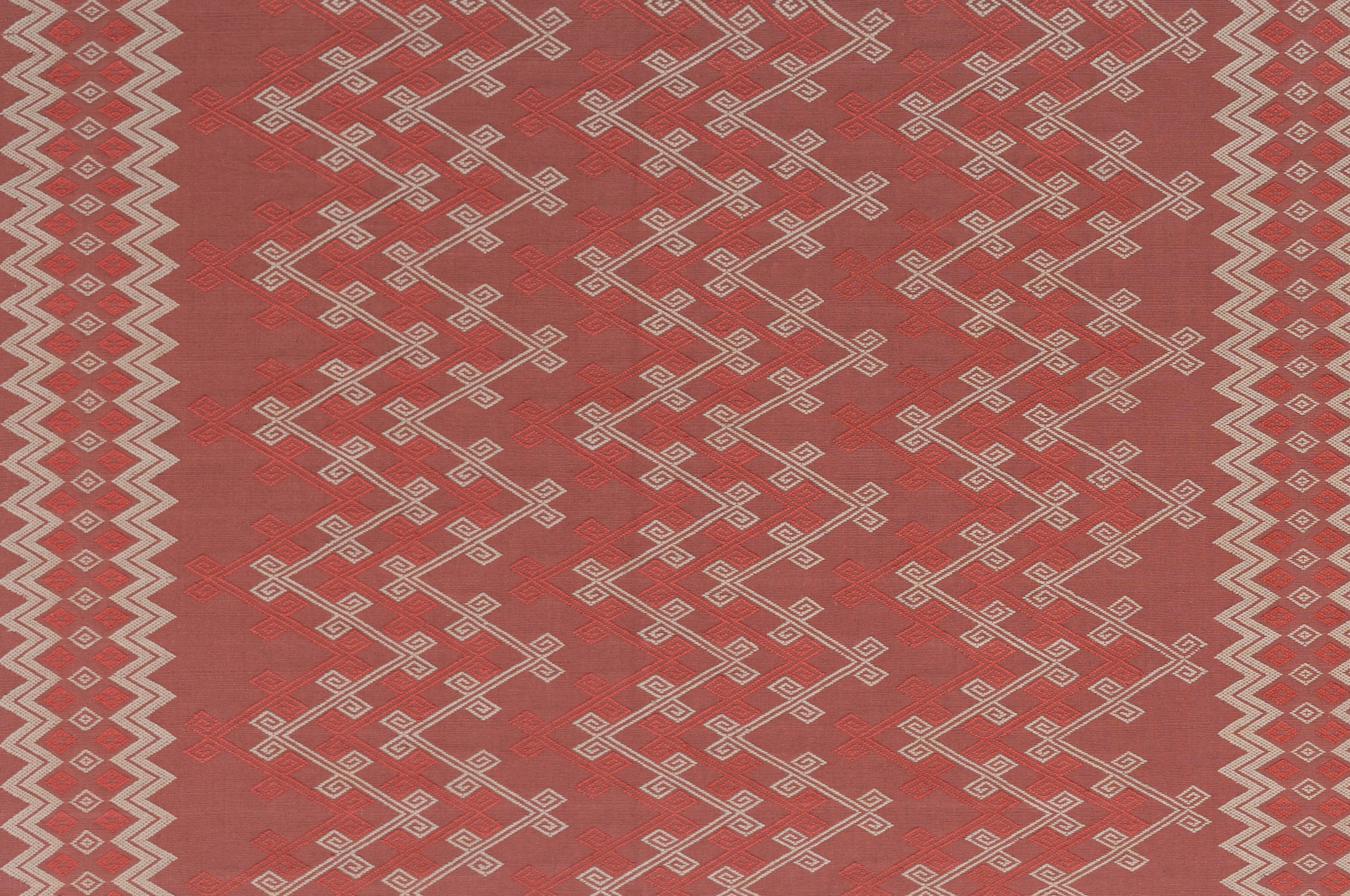 Red fabric with a geometric pattern