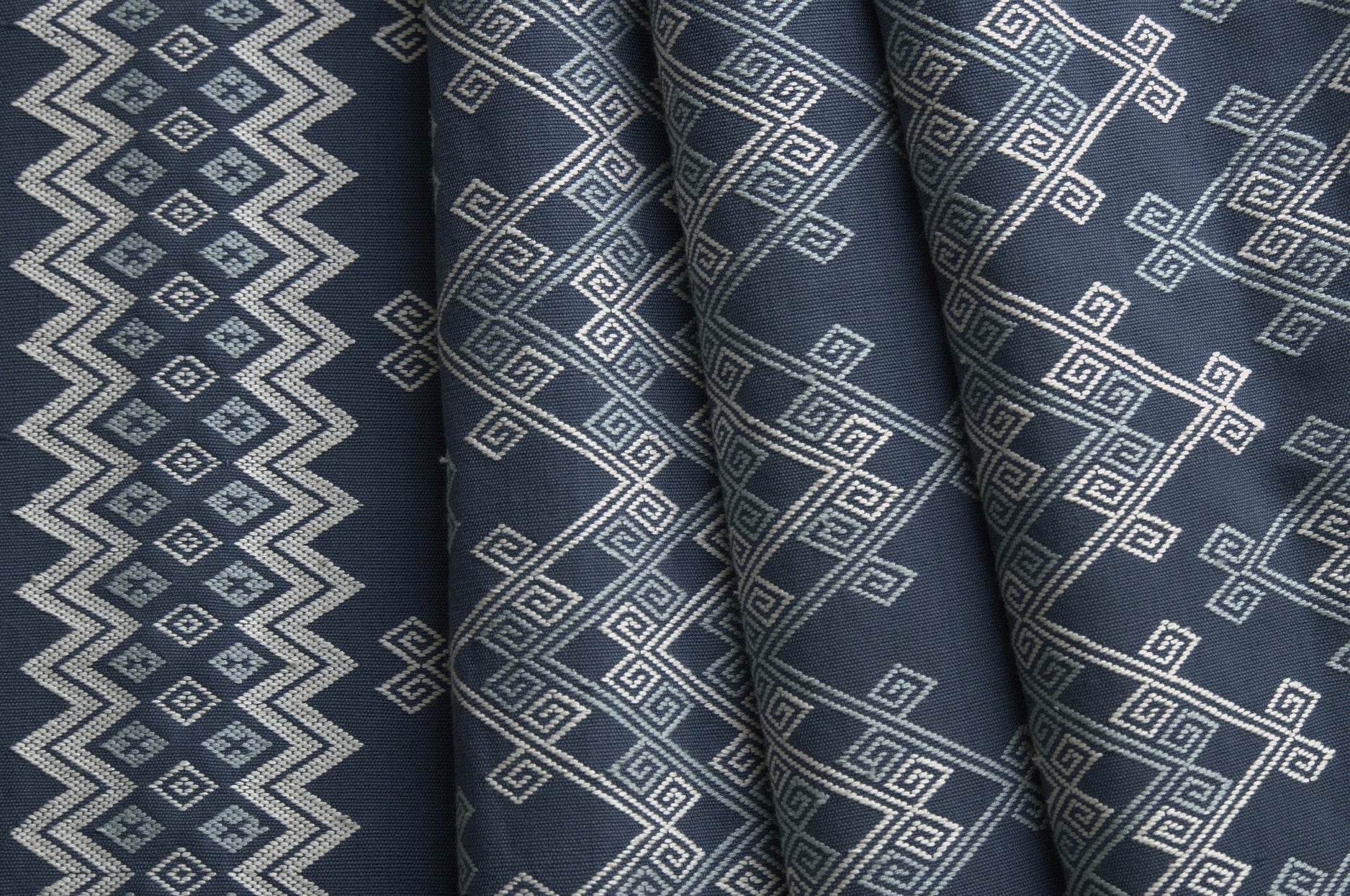 Navy fabric with geometric white pattern