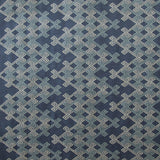 Textile with geometric pattern on a blue background