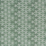Textile pattern with white geometric design on a green background