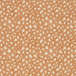 Patterned fabric with a design of curved shapes in orange on a beige background