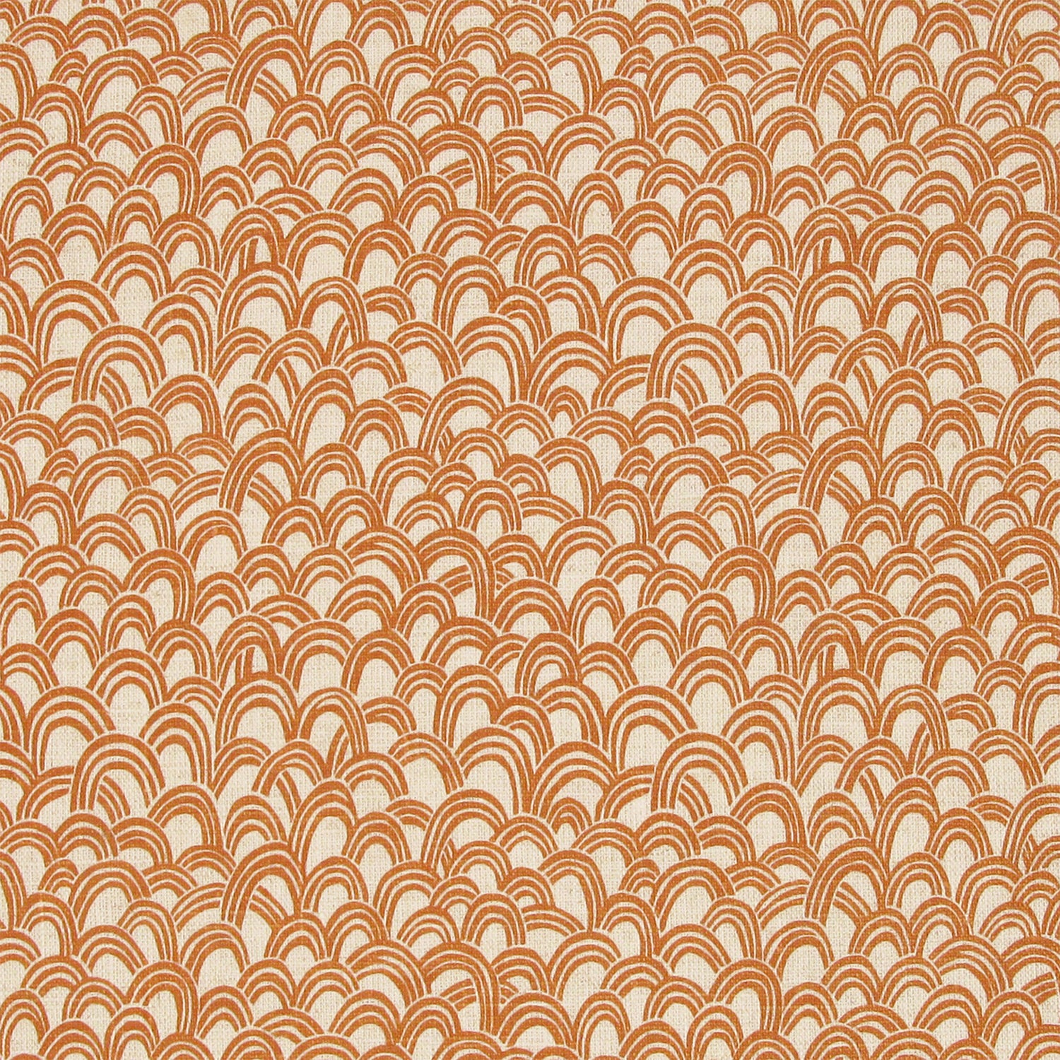 Patterned fabric with a design of curved shapes in orange on a beige background