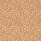 Patterned fabric with a design of curved shapes in orange on a beige background