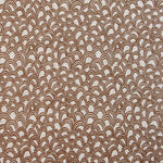 Patterned fabric with a design of curved shapes in brown on a beige background