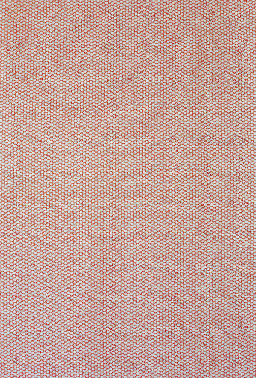 Detail of fabric in a dense checked weave in red and white.