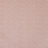 Detail of the reverse side of fabric in a dense checked weave in red and white.