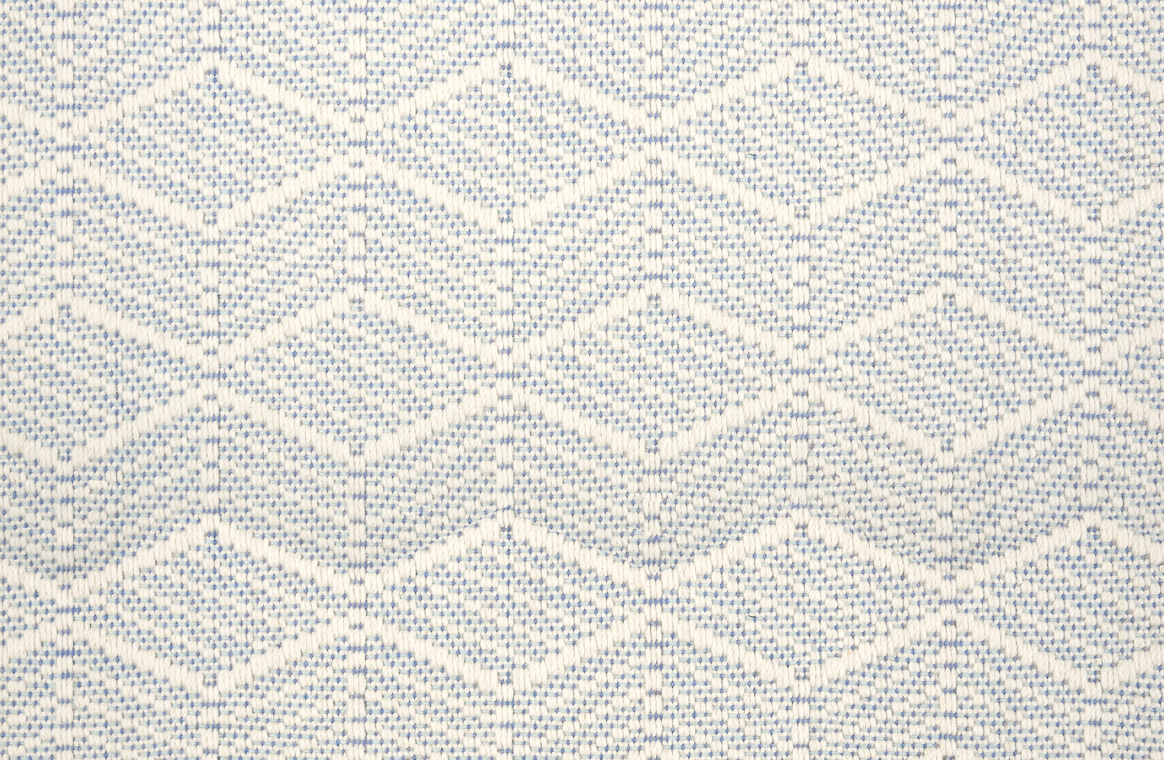 Broadloom in a dimensional herringbone stripe in cream and blue