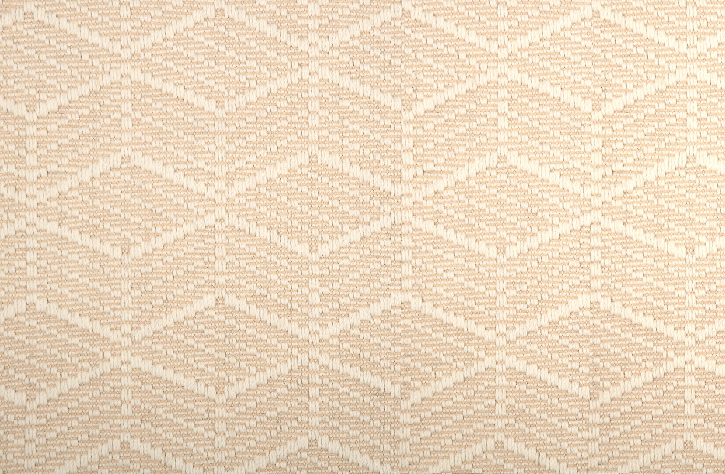 Broadloom in a dimensional herringbone stripe in cream and beige.