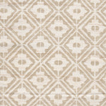 Detail of fabric in a geometric lattice grid in tan on a cream field.