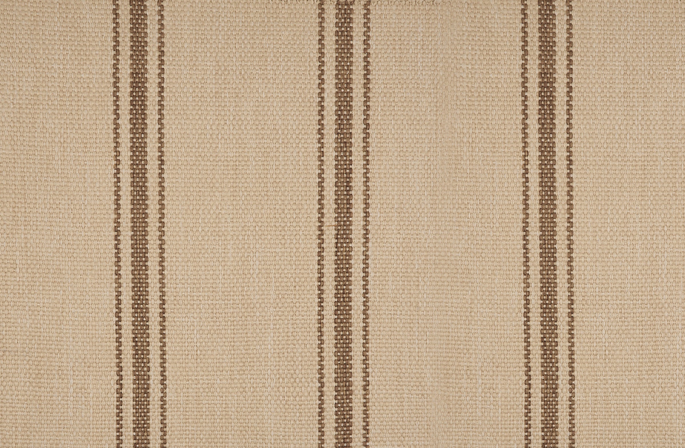 Outdoor broadloom carpet in a wide stripe in brown and creme. 