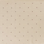 Printed linen fabric in a repeating small-scale flower pattern in red and gray on a cream field.