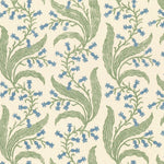 Printed linen in a scrolling floral pattern in blue and green on a cream field. 