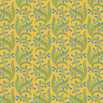 Wallpaper in a scrolling floral pattern in blue and green on a yellow field. 