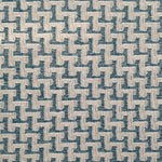Close up of a handwoven rug with cream stair step stripe on turquoise field. 