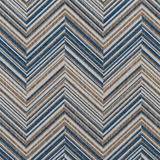 Broadloom carpet in a bold chevron pattern in shades of white, brown and marine blue.