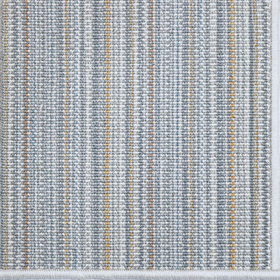 Broadloom carpet  with vertical stripes in gray, tan and blue