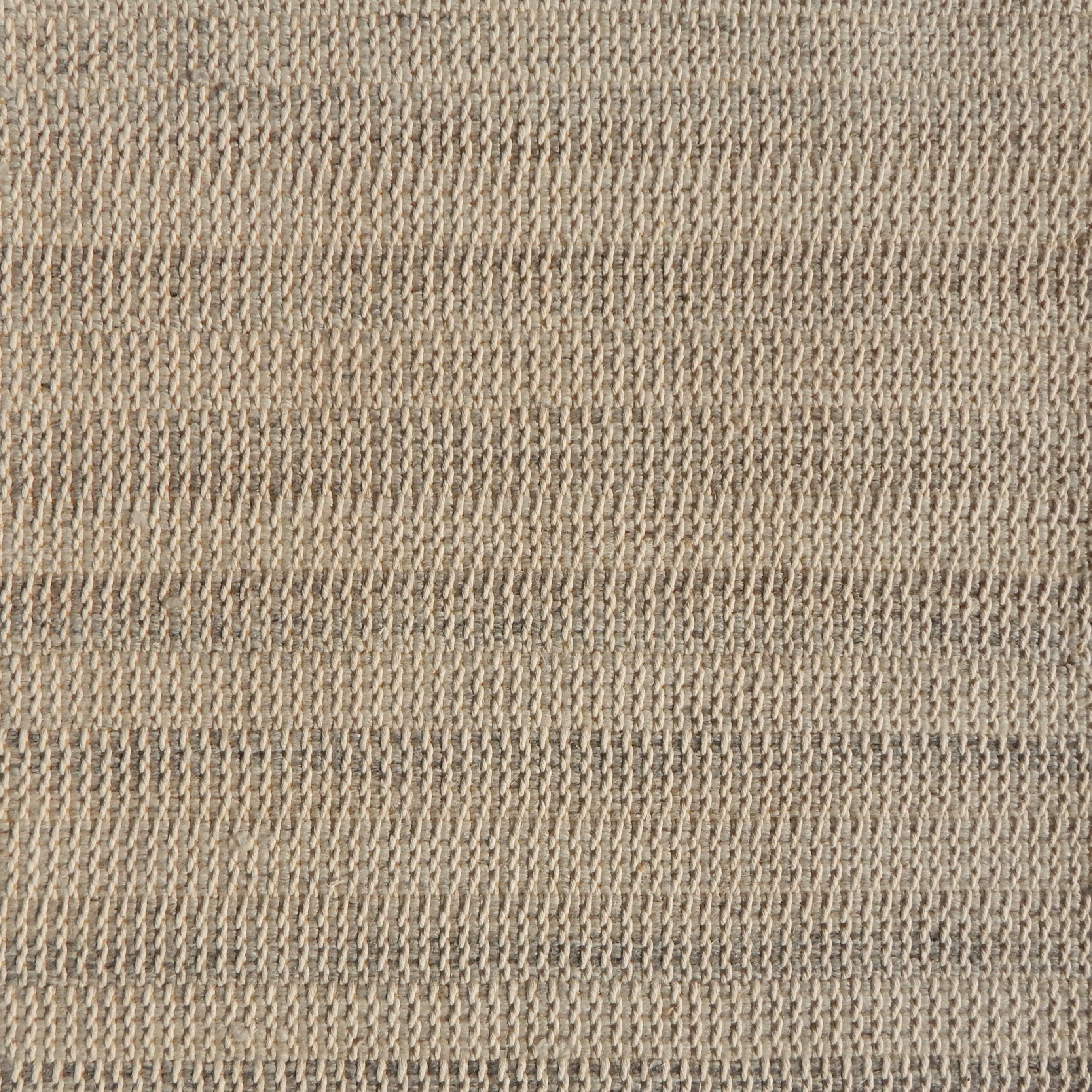 Flatweave rug in a textural stripe in shades of taupe