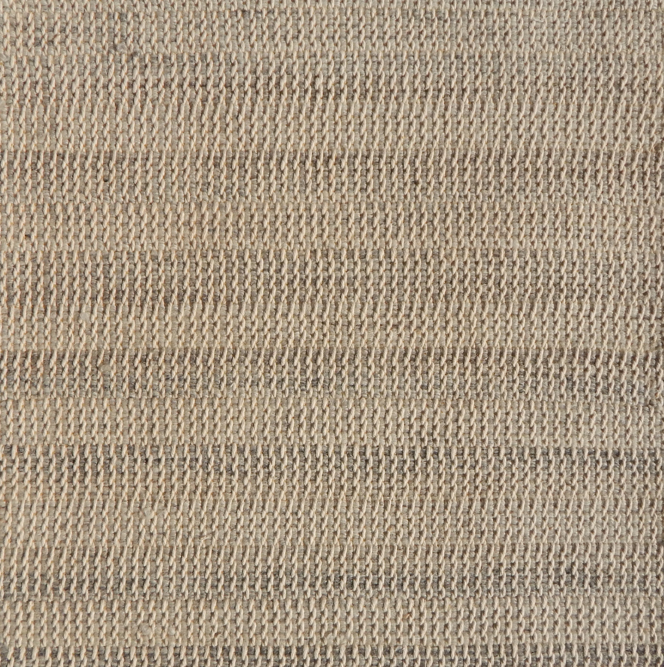 Flatweave rug in a textural stripe in shades of taupe