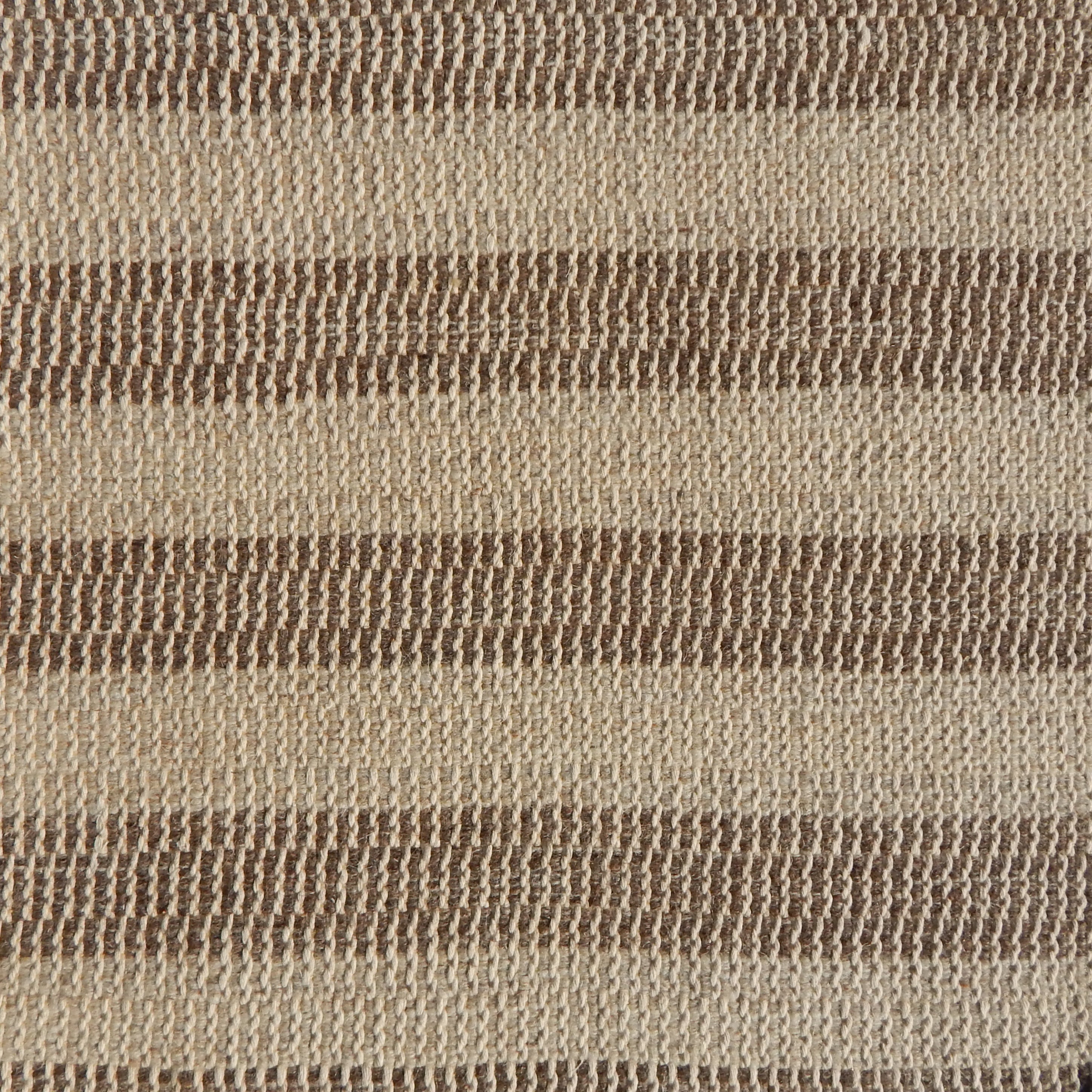 Flatweave rug in a textural stripe in shades of brown