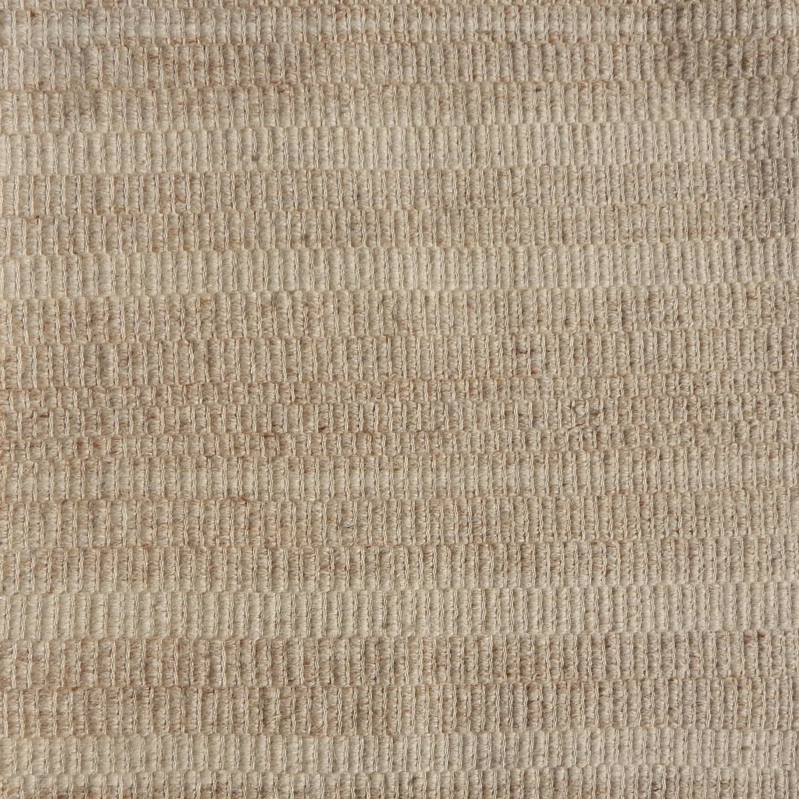 Flatweave rug in a subtle texture in taupe.