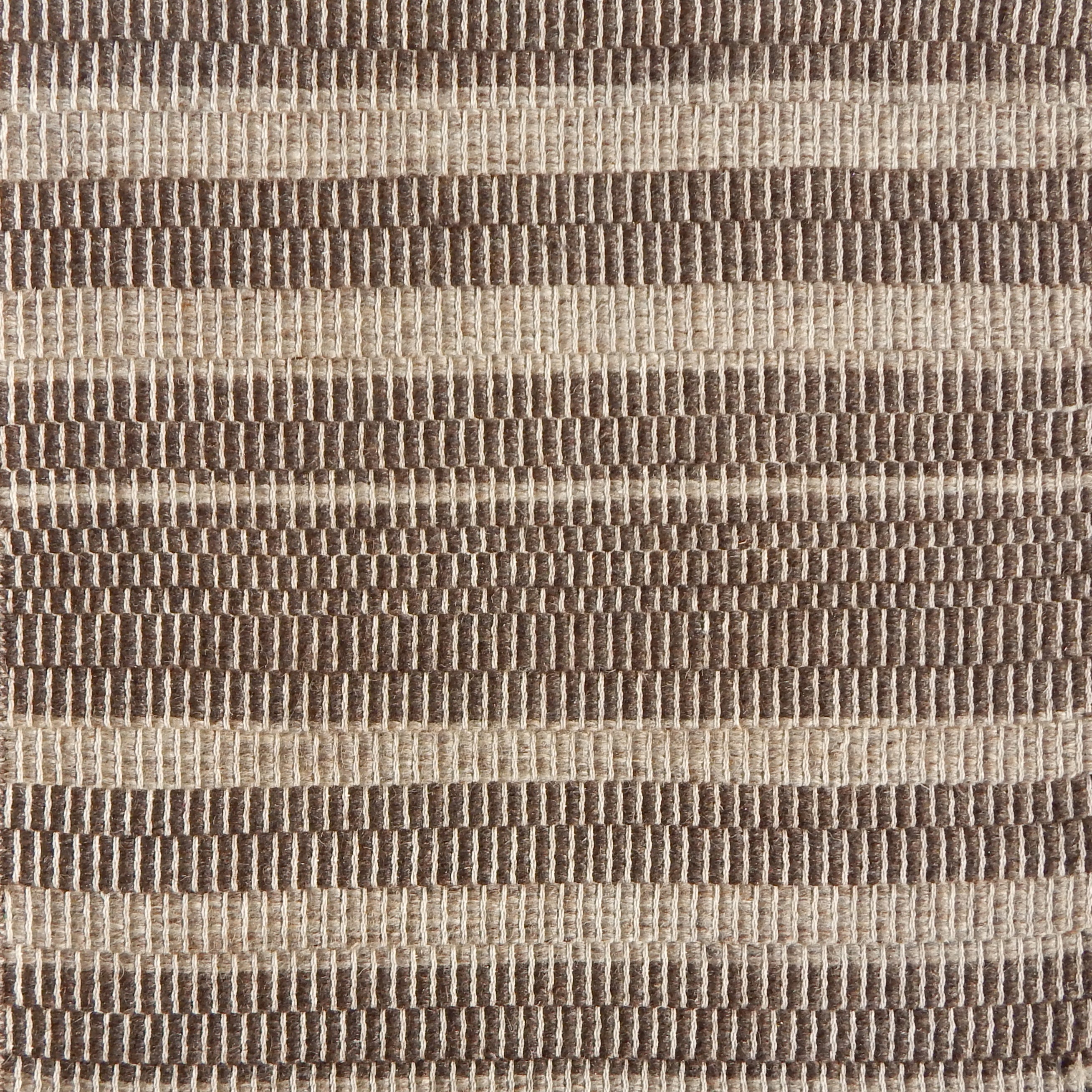 Flatweave rug in a subtle stripe in shades of brown