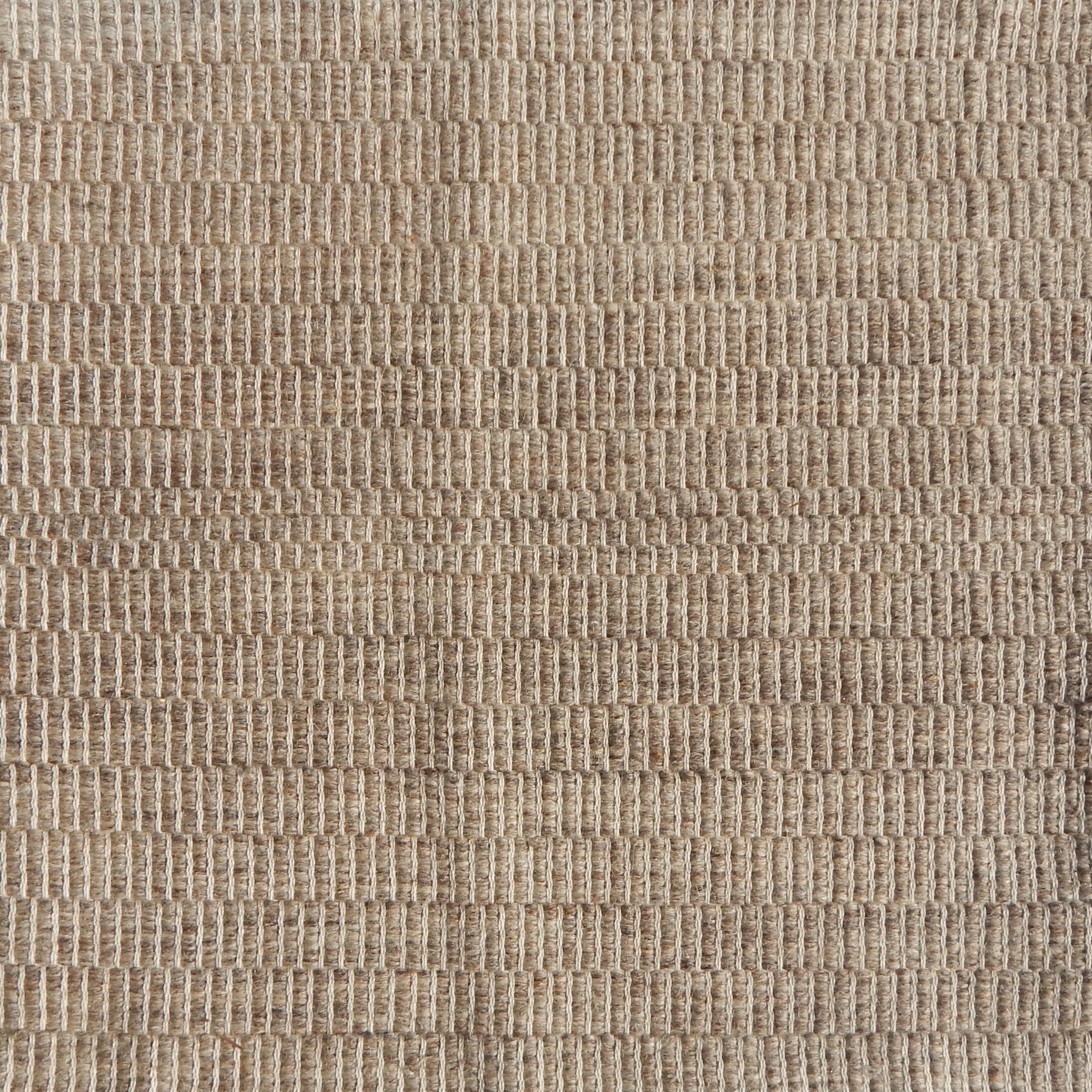 Flatweave rug in a textural brown