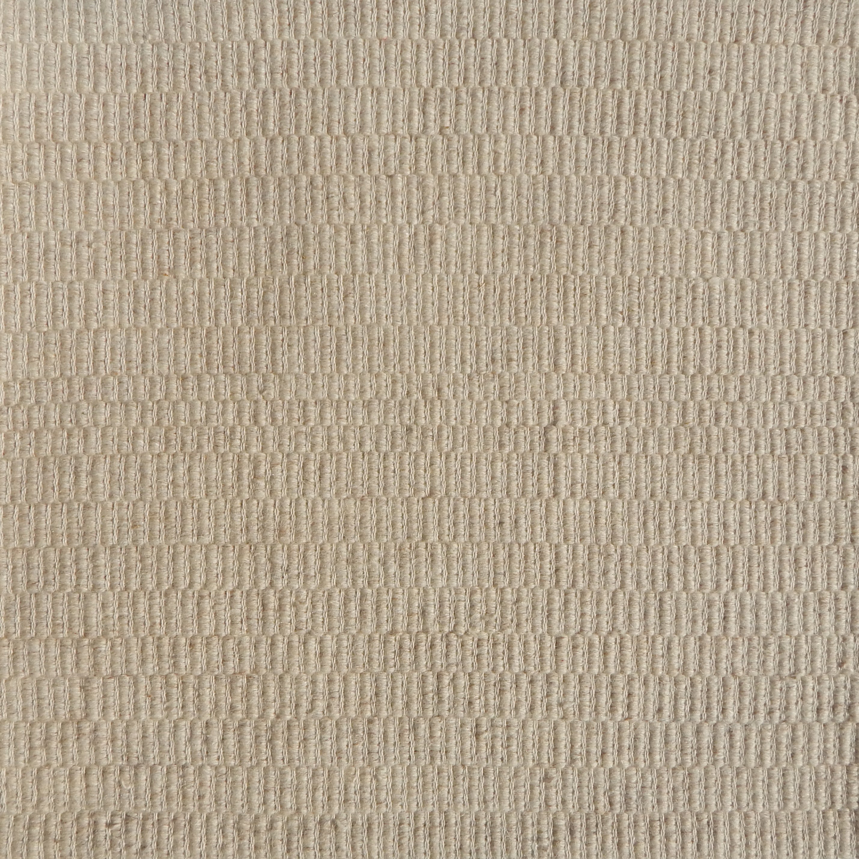 Flatweave rug in a textural stripe in oatmeal