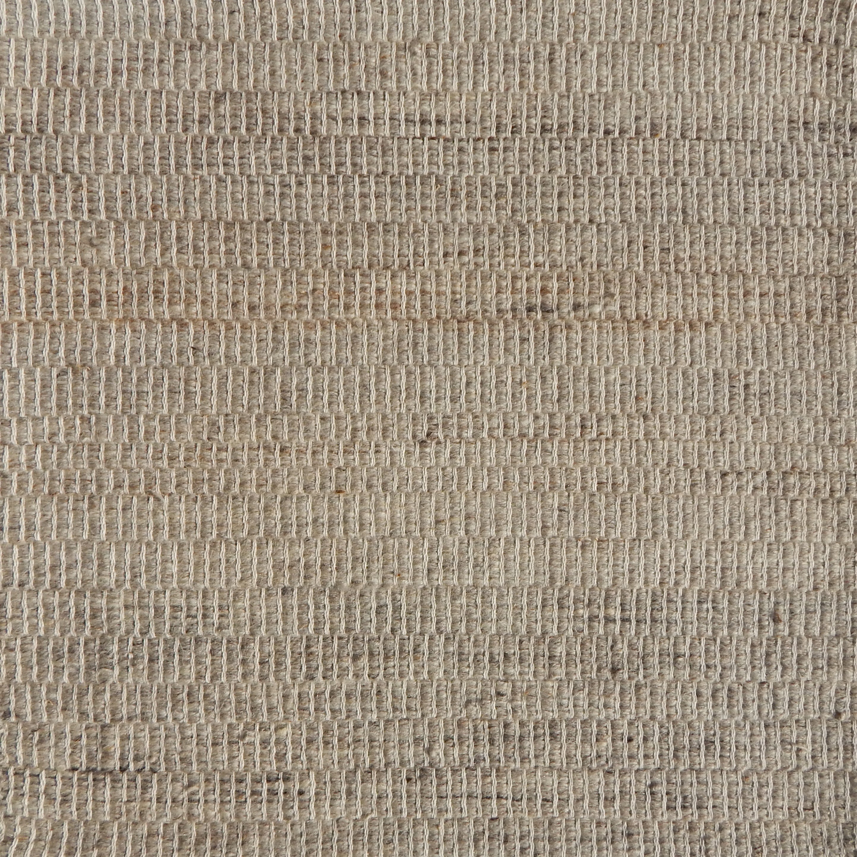 Flatweave rug in a textural taupe