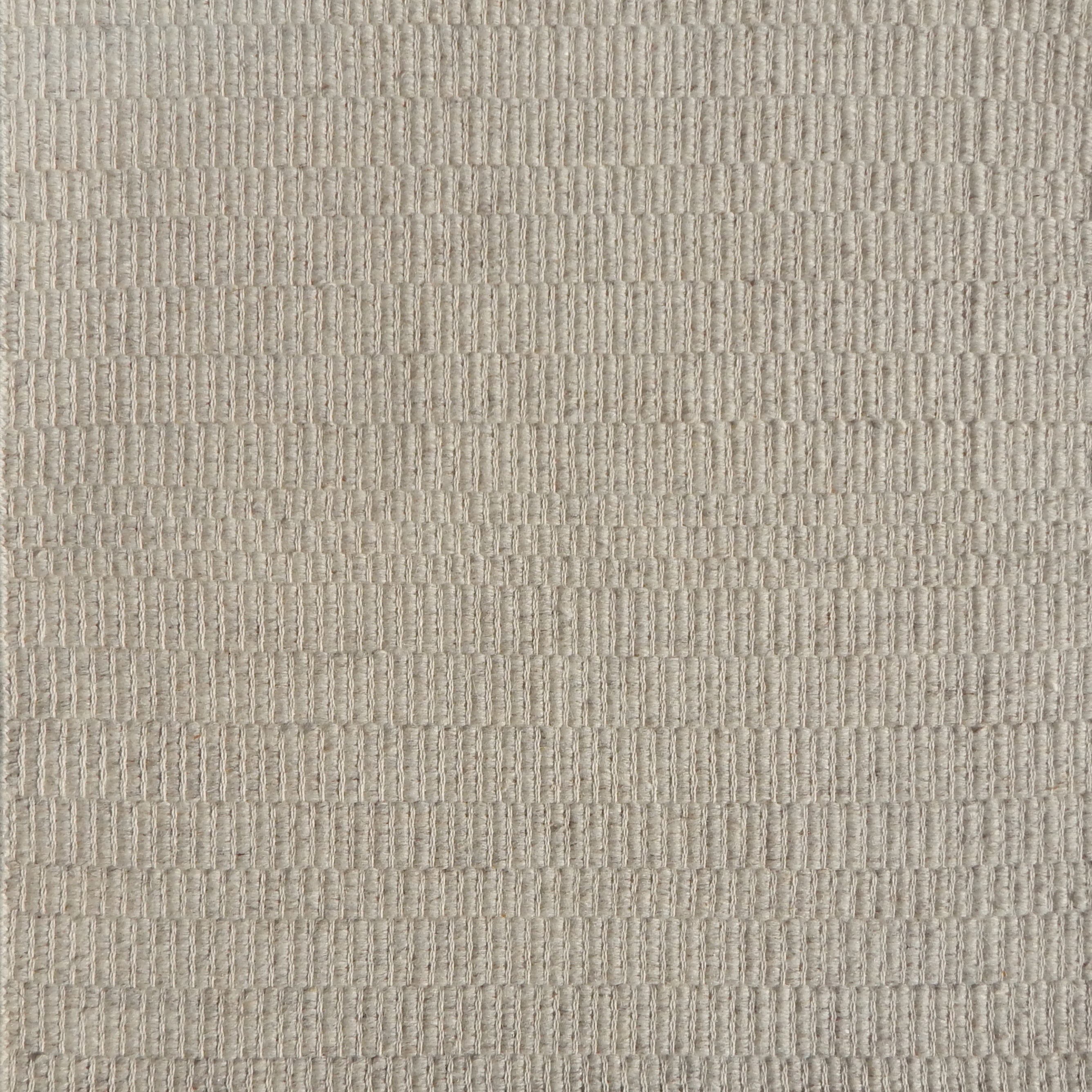 Flatweave rug in a textural light grey