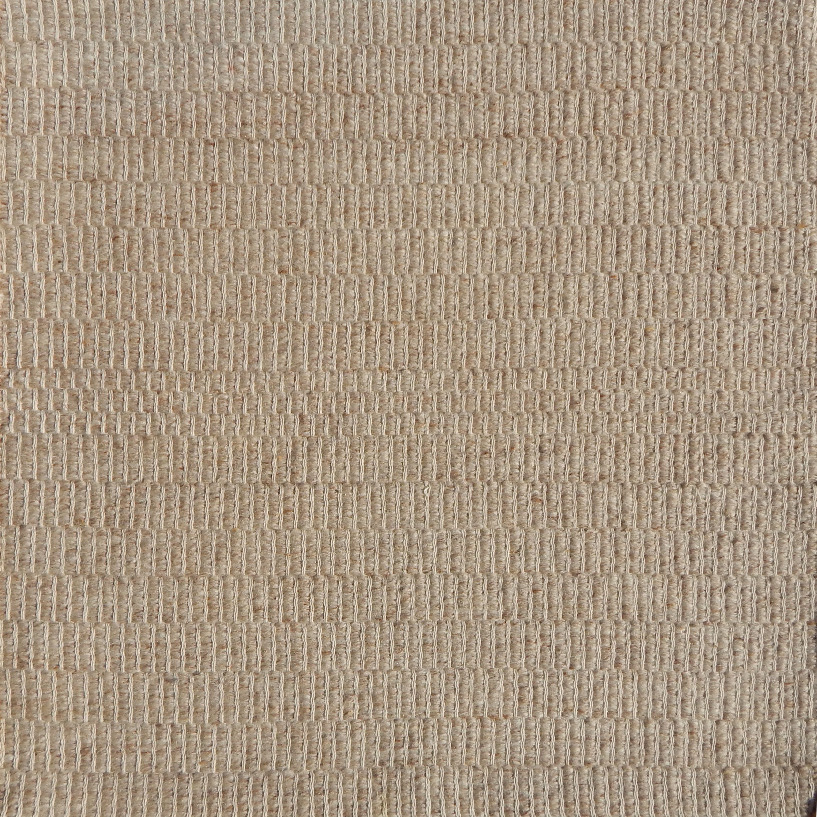 Flatweave rug in a textural taupe