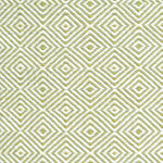 Handmade rug with concentric diamond pattern in white with lime green. 