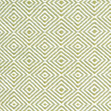 Handmade rug with concentric diamond pattern in white with lime green. 