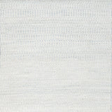 Textural woven carpet in pale sky blue