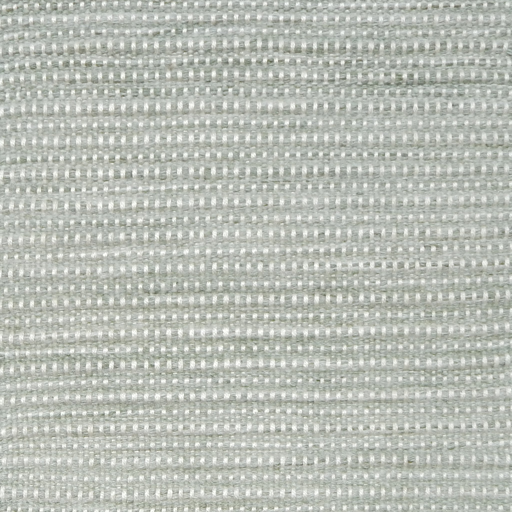 Close-up of pale grey textured woven rug
