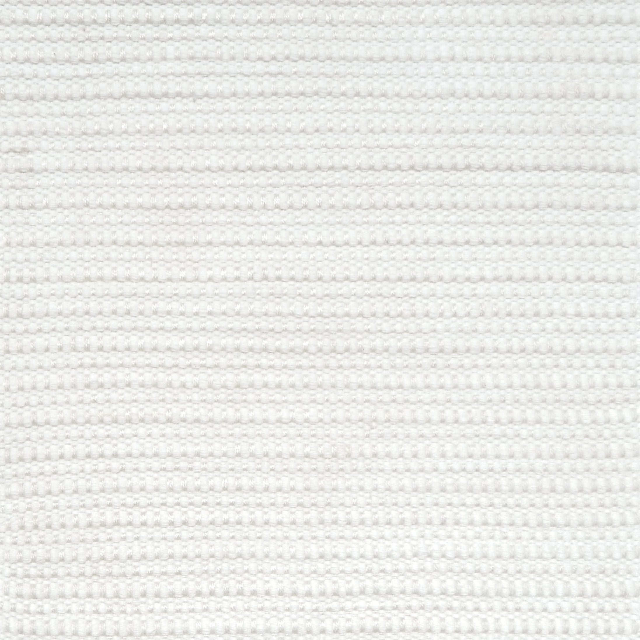 Close-up of bright white textured woven rug