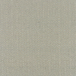 Flatweave carpet in herringbone pattern in cream and aqua. 