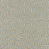 Flatweave carpet in herringbone pattern in cream and aqua. 