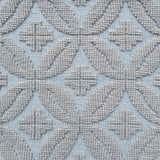 Handmade rug with classic circle lattice design in grey on a blue field. 