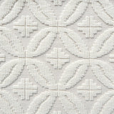 Handmade rug with classic circle lattice design in white. 